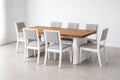 Juego de mesa de comedor de madera con siete sillas de tela gris